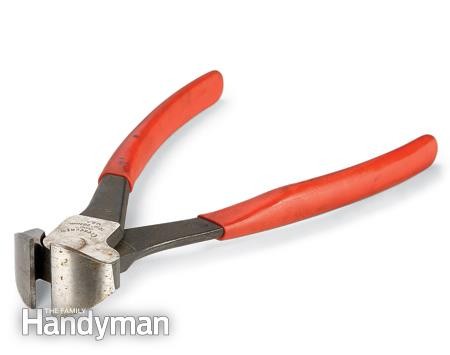 use nipper pliers to pull nails from trim boards